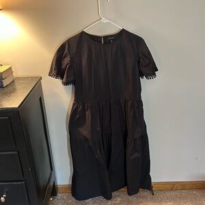 Chic Black Dress with Ruffle Sleeves